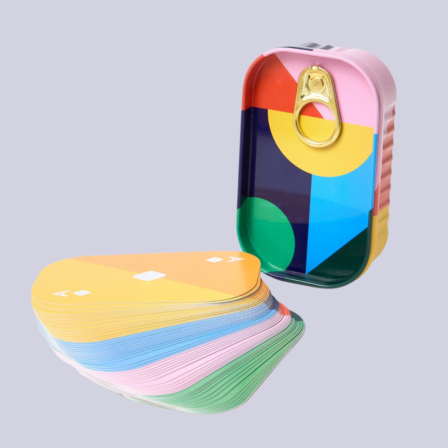 A tin can of colorful playing cards