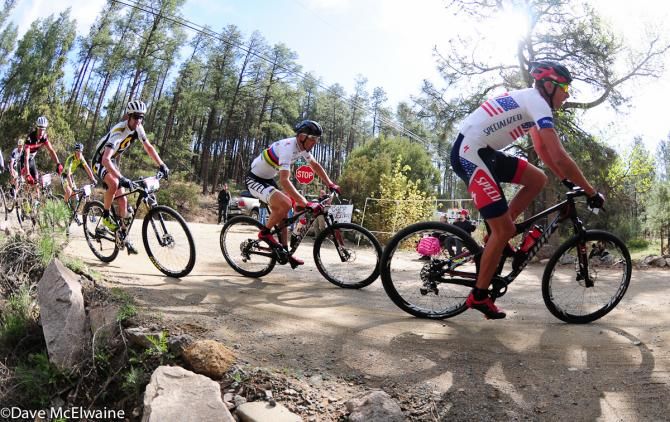 Christoph Sauser (Specialized) marking his teammate Wells' wheel