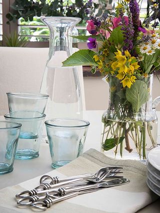 detail of small dining table in garden room in 16th-century home