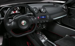 Black car interior with red stitch detailing