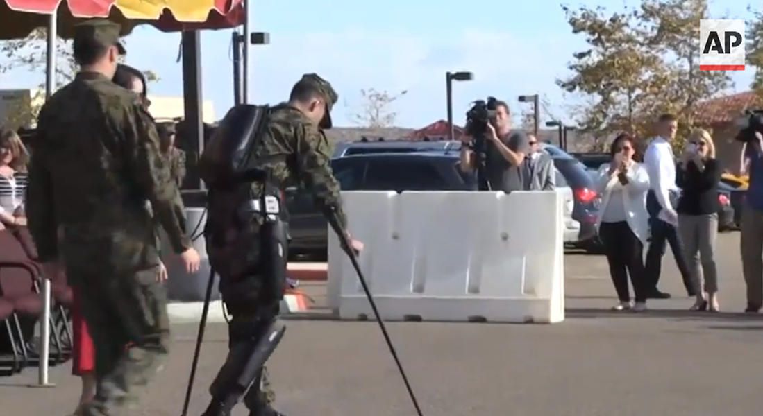 Watch a paralyzed Marine walk to receive his Bronze Star with help from robotic braces