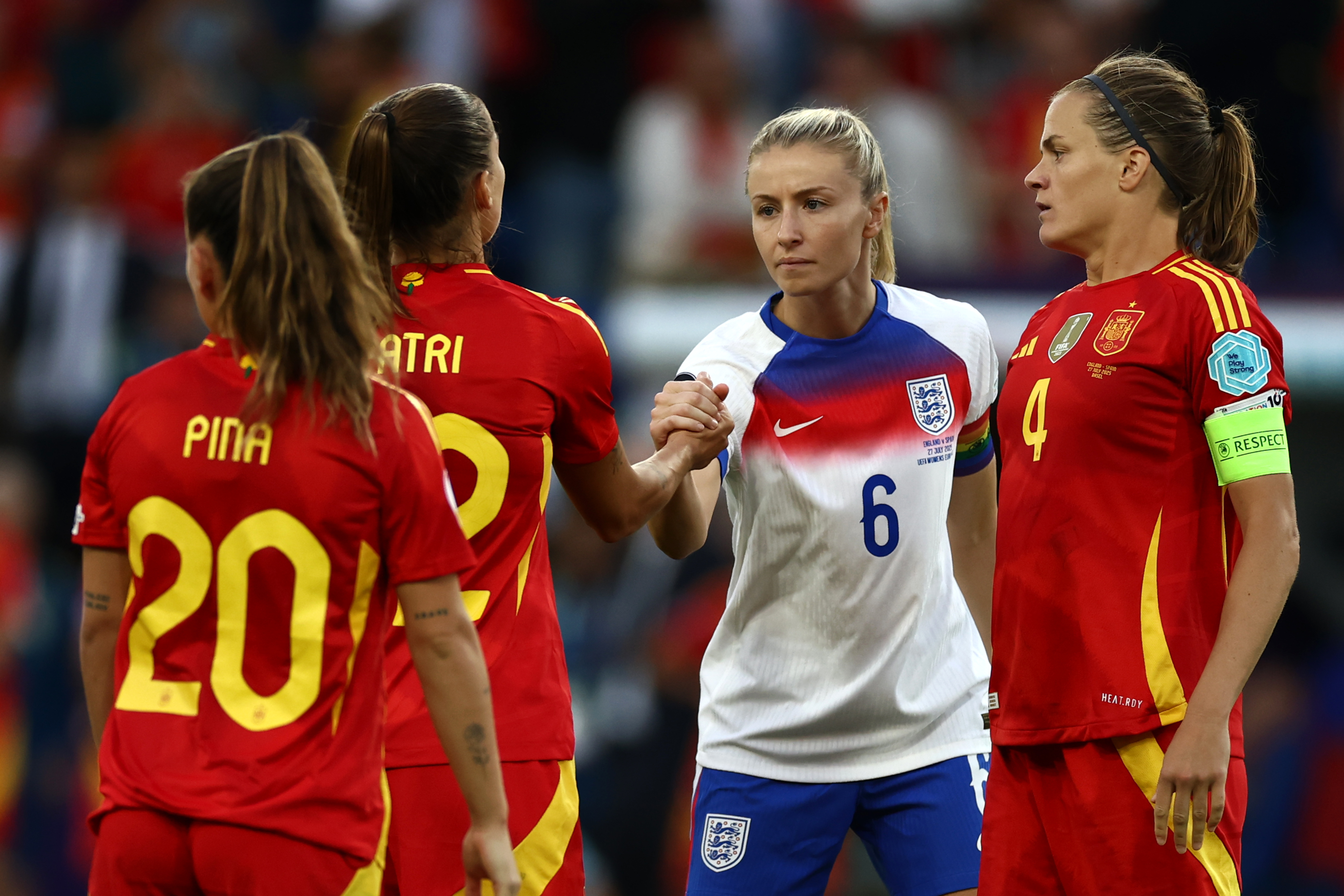 BASEL, SWITZERLAND - JULY 27: Irene Paredes of Spain is embraced by Leah Williamson of England after the UEFA Women's EURO 2025 Final match between England and Spain at St. Jakob-Park on July 27, 2025 in Basel, Switzerland. 
