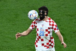 Croatia's defender #20 Josko Gvardiol eyes the ball during the Qatar 2022 World Cup Group F football match between Croatia and Canada at the Khalifa International Stadium in Doha on November 27, 2022.