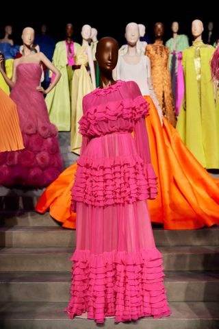 Mannequin in pink Valentino dress in exhibition