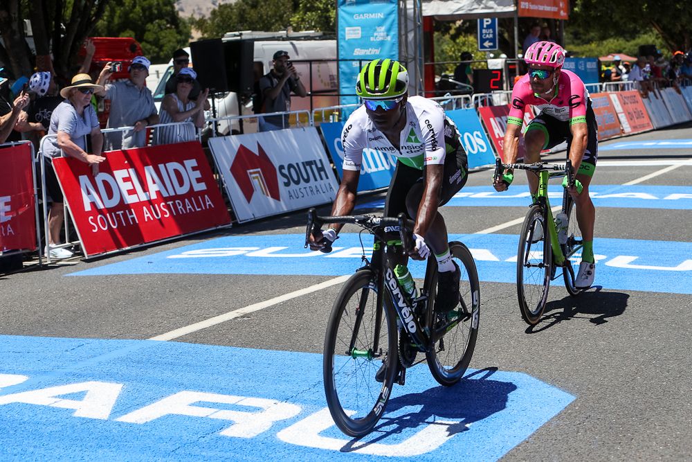 Nicholas Dlamini leads will Clarke in the breakaway during stage 1 at the Tour Down Under