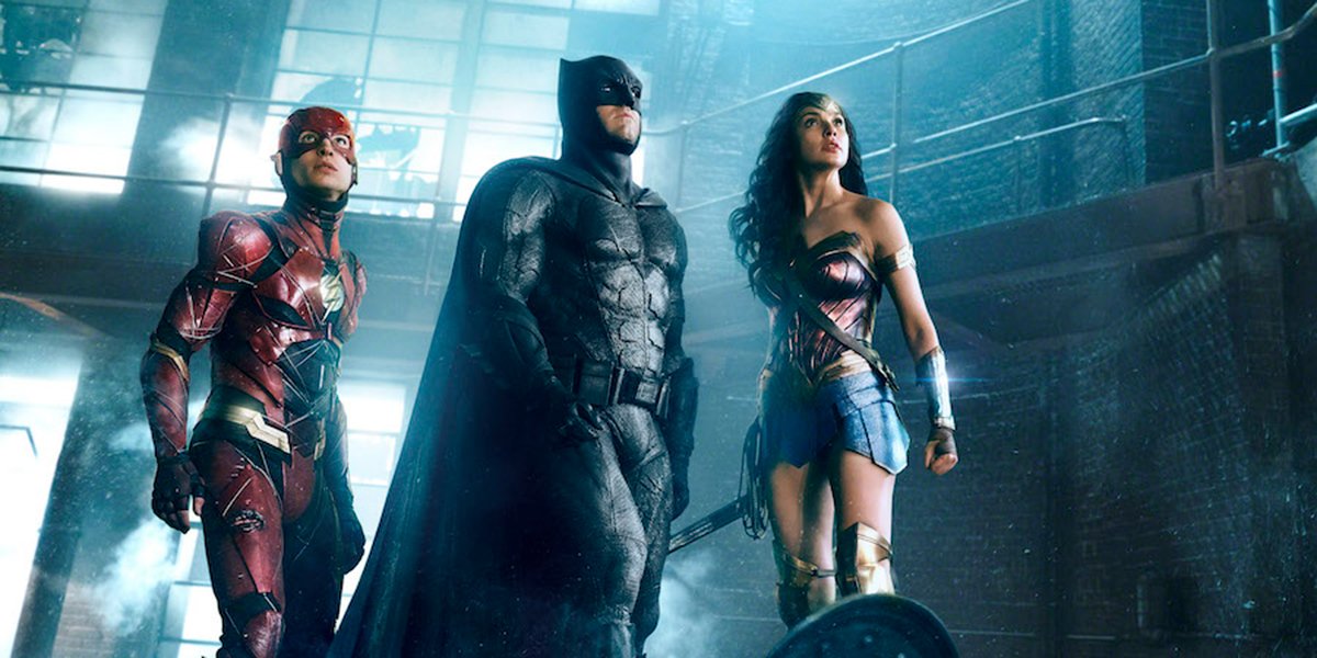 The Flash, Batman and Wonder Woman looking heroic