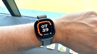 Fitbit Ace LTE on a person's wrist