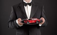 Smart person holding tray with car 