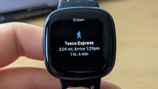 fitbit versa 4 with google maps pre-trip summary on screen