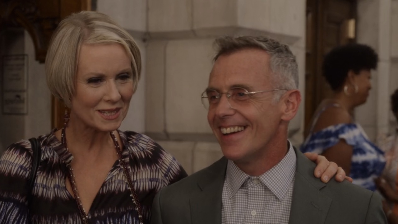 Miranda and Steve smiling at the And Just Like That Season 1 premiere