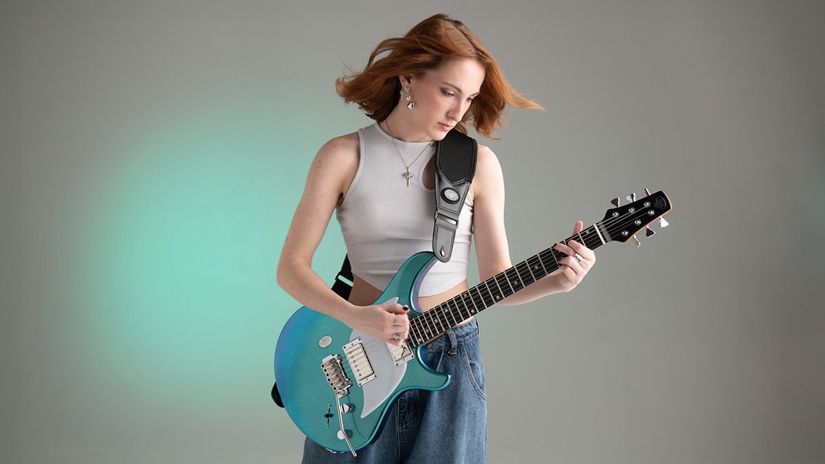 Guitarist playing a Venus Guitars model