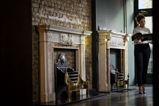 Fireplaces - fire surrounds leaning on a wall