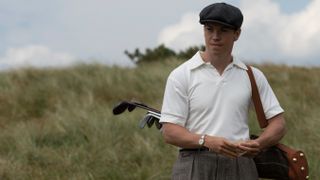 Will Poulter in golfing gear in Why Didn't They Ask Evans?