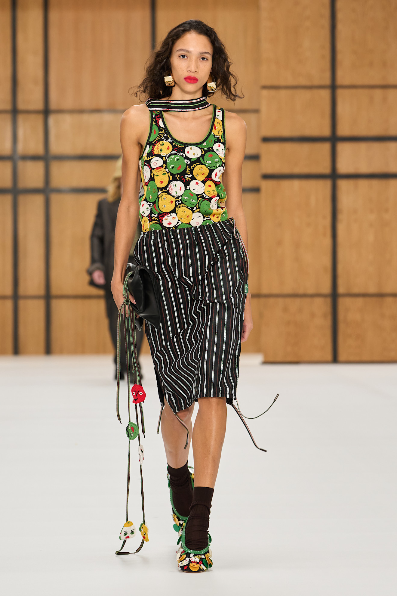 a model walks the burberry spring/summer 2027 runway.