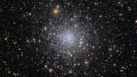A glittering bundle of stars against the darkness of space.