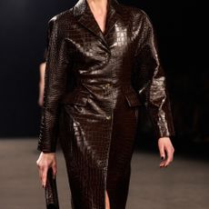 A selection of looks from the autumn/winter 2026 runways in the shades grey, teal, brown and navy 