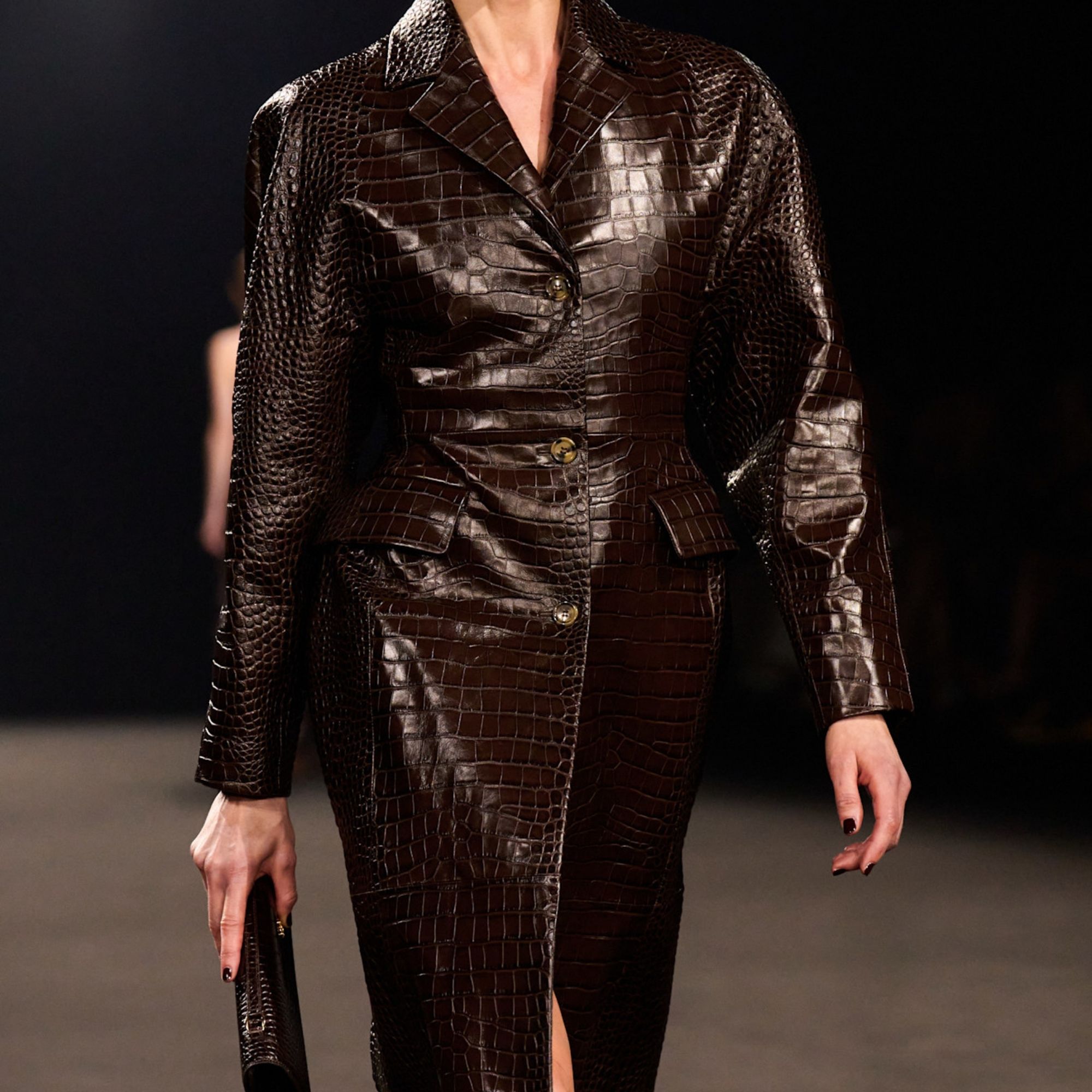 A selection of looks from the autumn/winter 2026 runways in the shades grey, teal, brown and navy 
