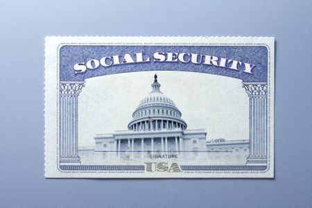 A Social Security card with the United States Capitol building on it