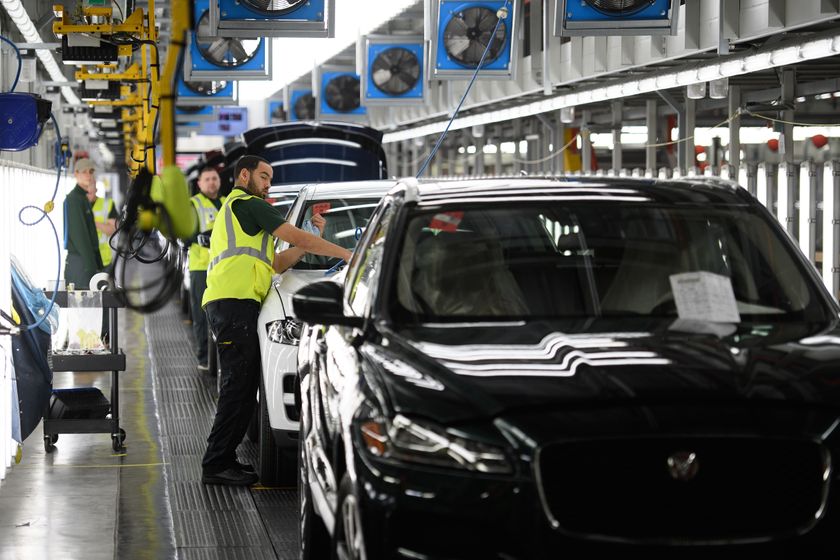 Vehicles are checked before moving to the next stage of production at the Jaguar Land Rover factory on March 1, 2017 in Solihull, England.
