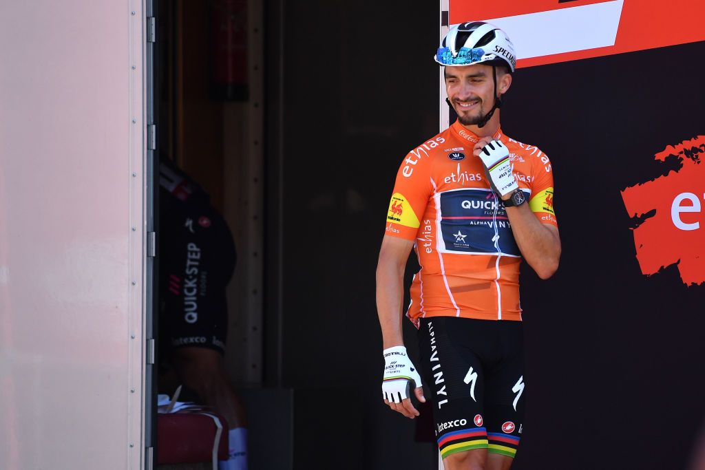 HERVE BELGIUM JULY 24 Julian Alaphilippe of France and Team QuickStep Alpha Vinyl Orange Leader Jersey during the team presentation prior to the 43rd Ethias Tour de Wallonie 2022 Stage 2 a 1768km stage from Verviers to Herve 274m ethiastourdewallonie22 on July 24 2022 in Herve Belgium Photo by Luc ClaessenGetty Images