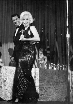Actress Marilyn Monroe attends the Golden Globe Awards