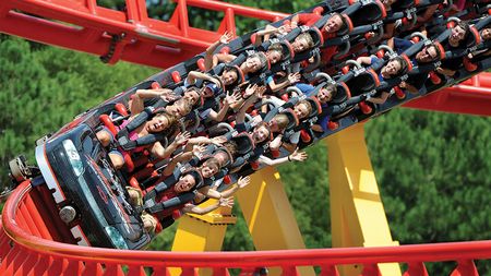 People on a rollercoaster