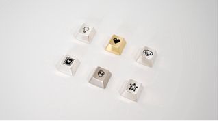 Susan Kare's Esc Keys collection in collaboration with Asprey Studio