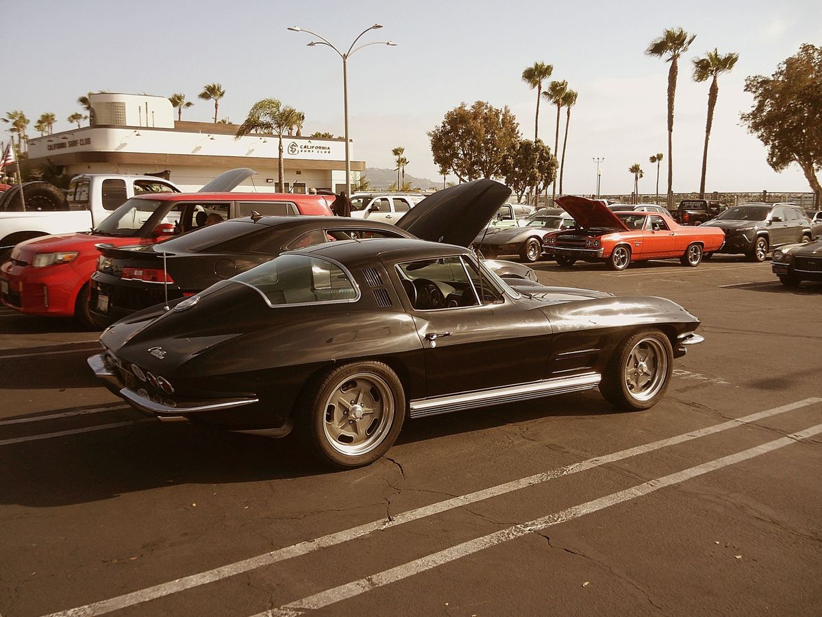 Sample image taken with Camp Snap 2 digital camera showing a vintage car parked on a sunny day