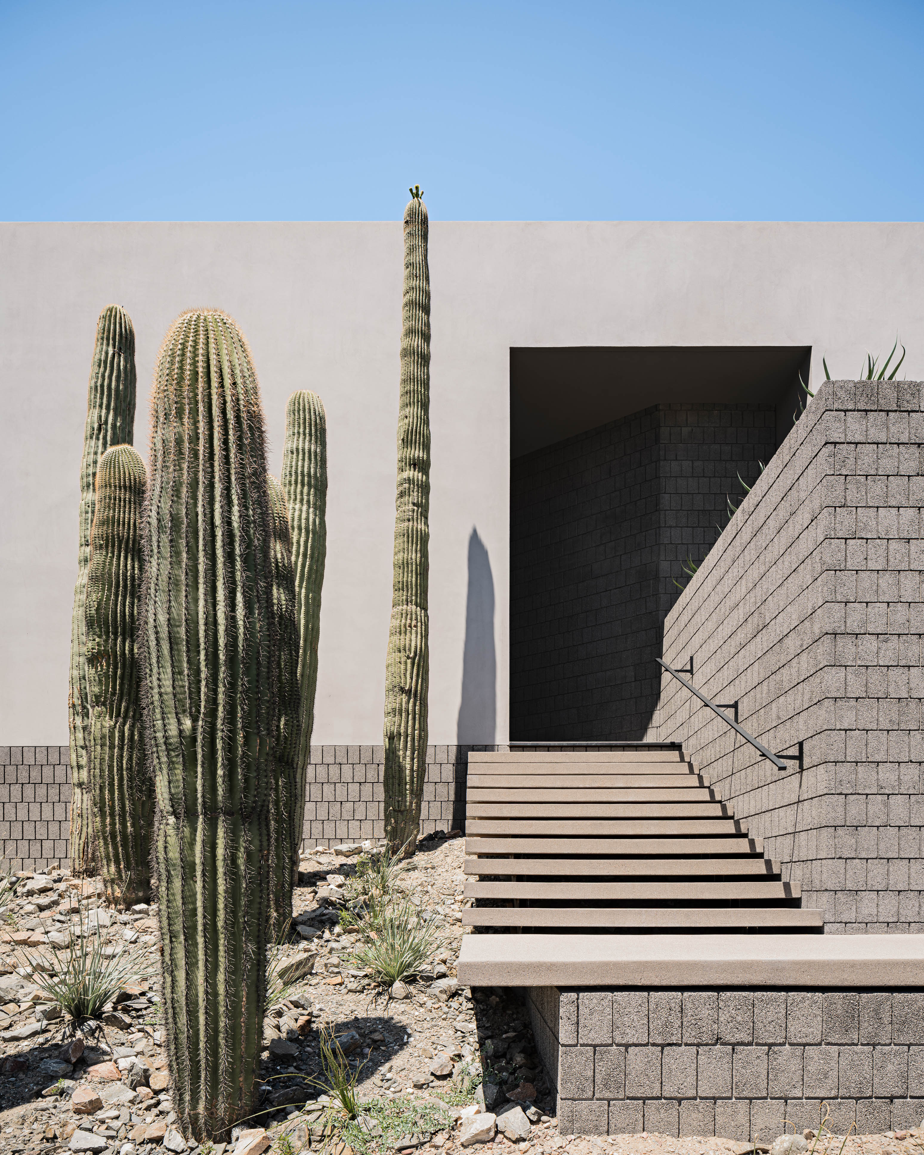Arizona home Shifted Horizon by A-I-R, block built minimalist home, textured and monolithic looking in desert environment