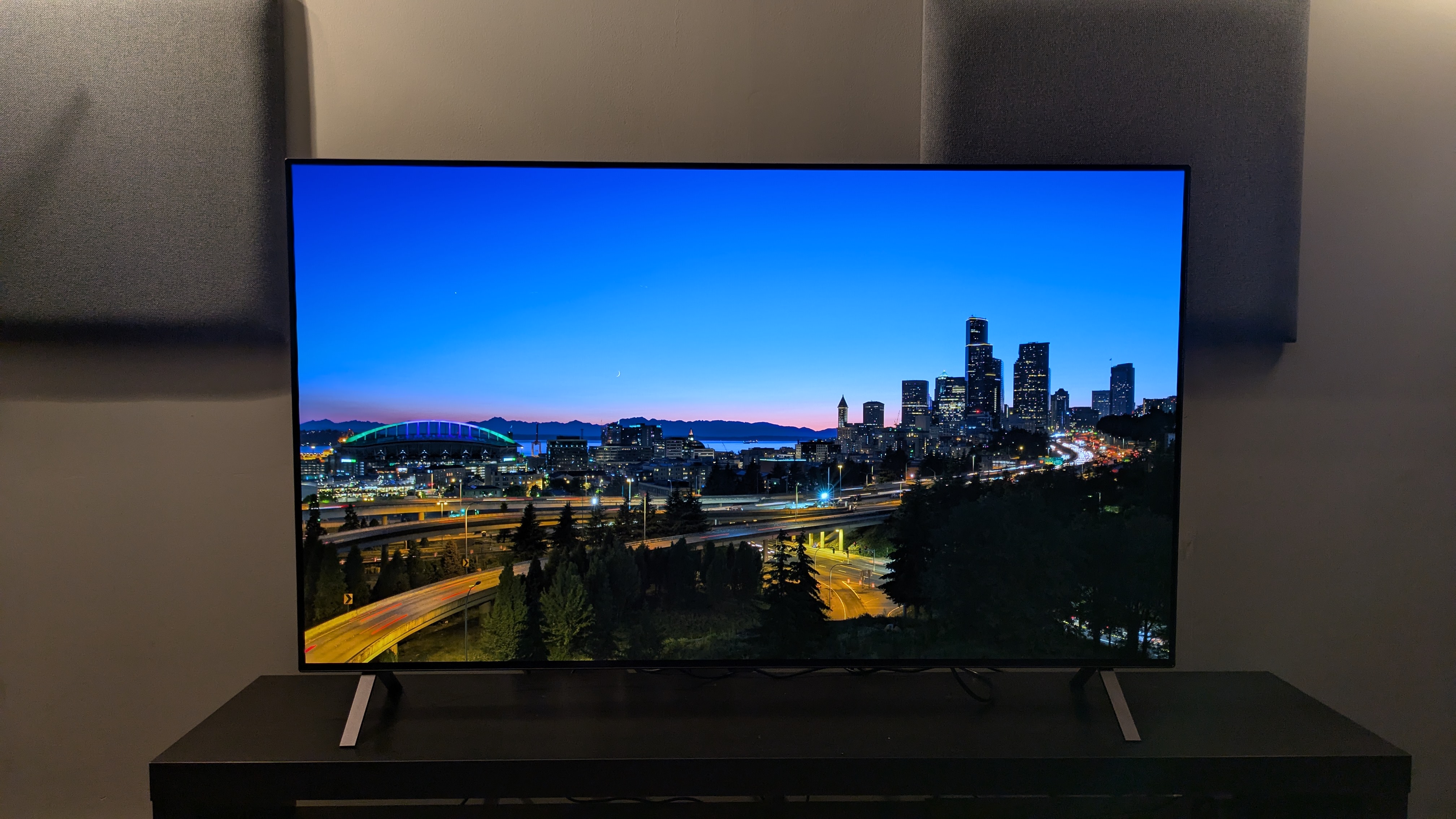 LG B5 OLED TV with sunset over a city on screen