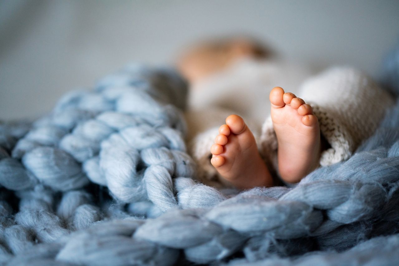 Newborn baby feet.