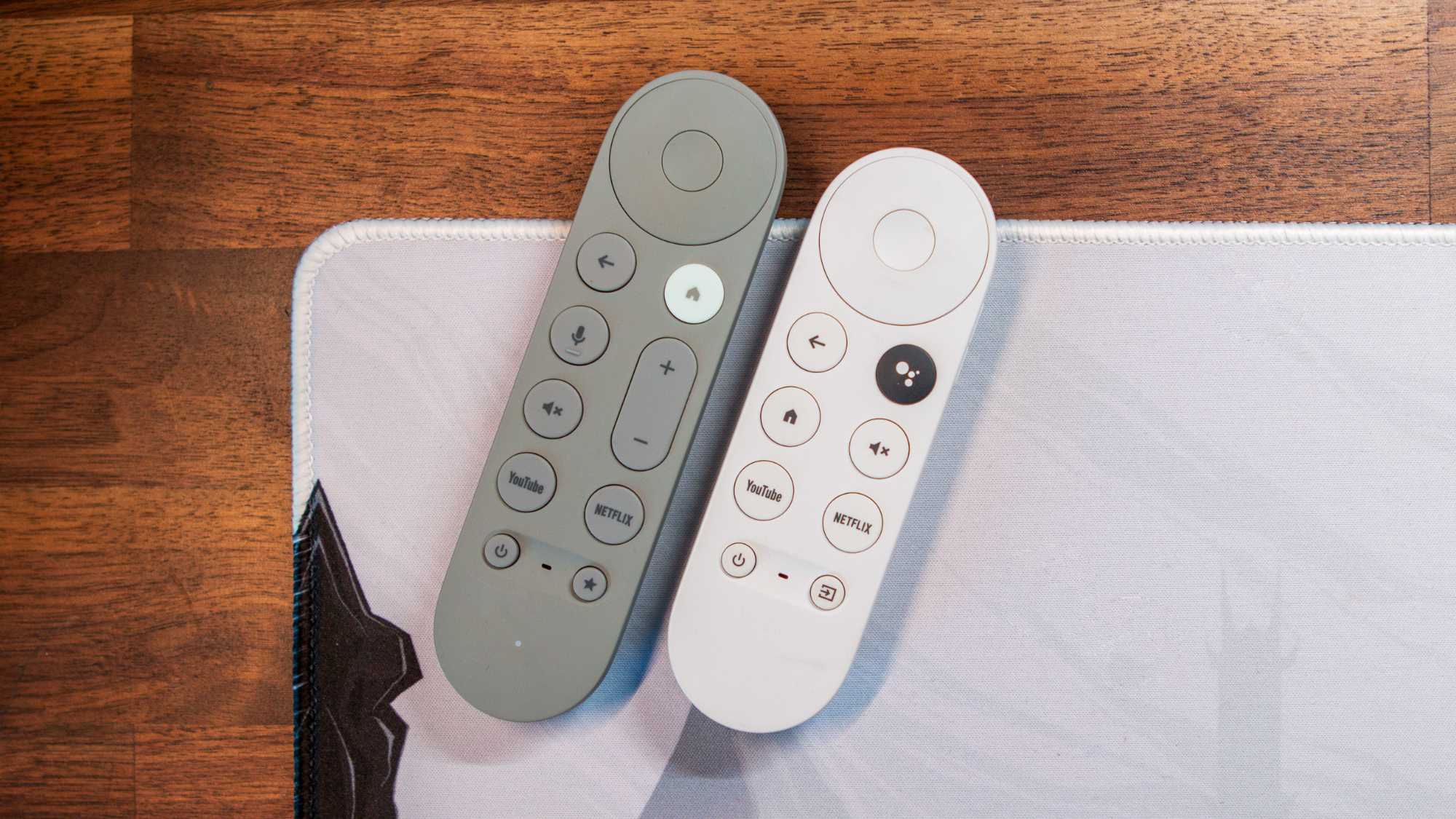 Google TV Streamer Remote next to Chromecast remote