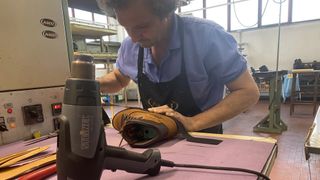 Inside an Italian hiking boot factory: rubber rand attachment