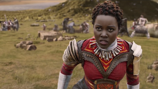 Lupita Nyong'o as Nakia in Dora Milaje outfit in Wakanda in Black Panther