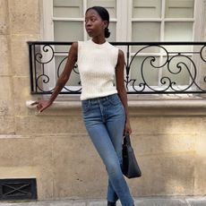 An image of @sylviemus_ wearing one of the best stovepipe jeans outfits.