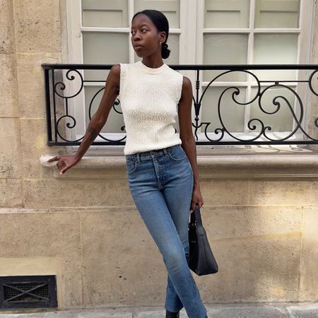 An image of @sylviemus_ wearing one of the best stovepipe jeans outfits.