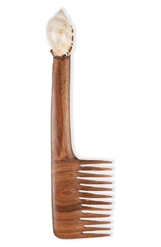 Brother Vellies At Home Wooden Comb with shell design on the end on a white background