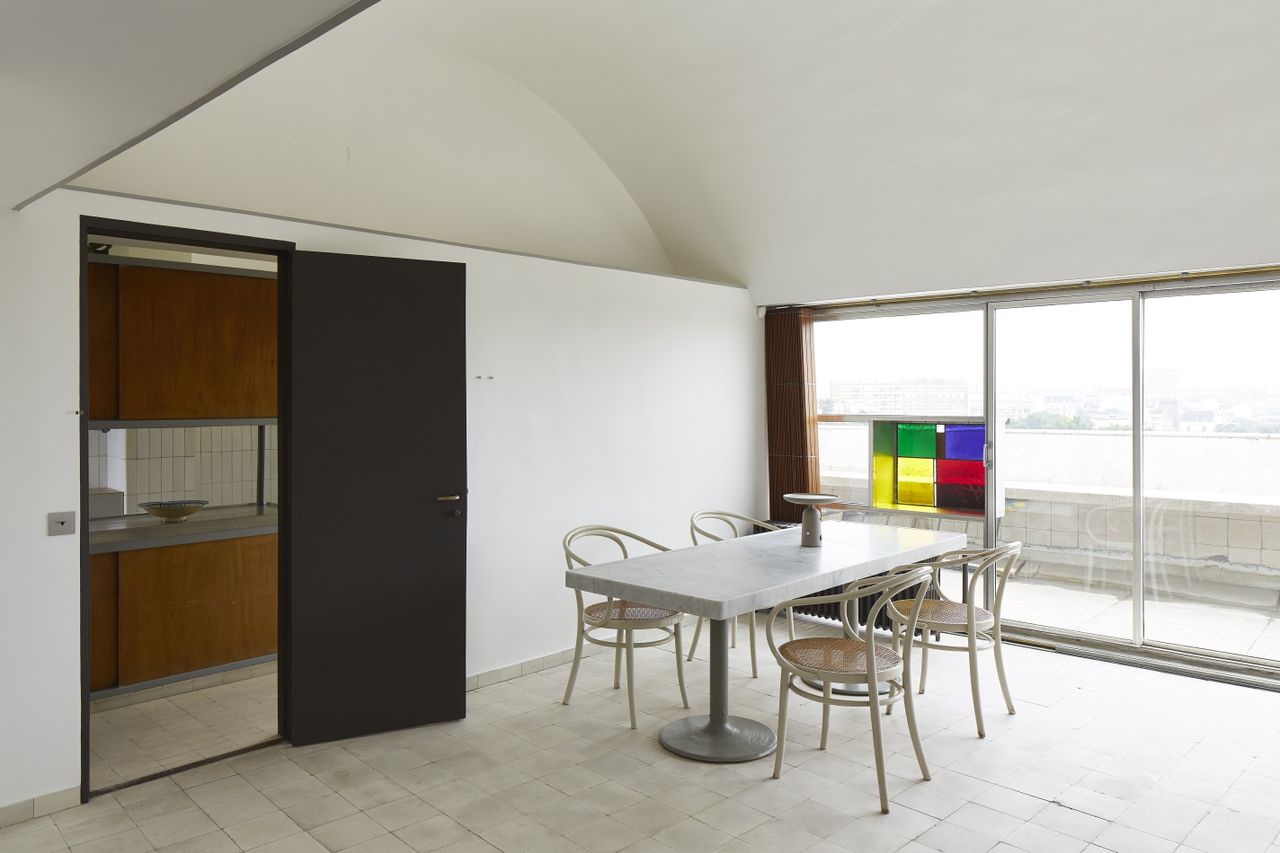 Dining room with stained glass window at Le corbusier&#039;s apartment in Paris