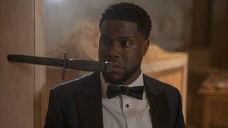 Kevin Hart as Kevin Hart with a knife in his face in Die Hart