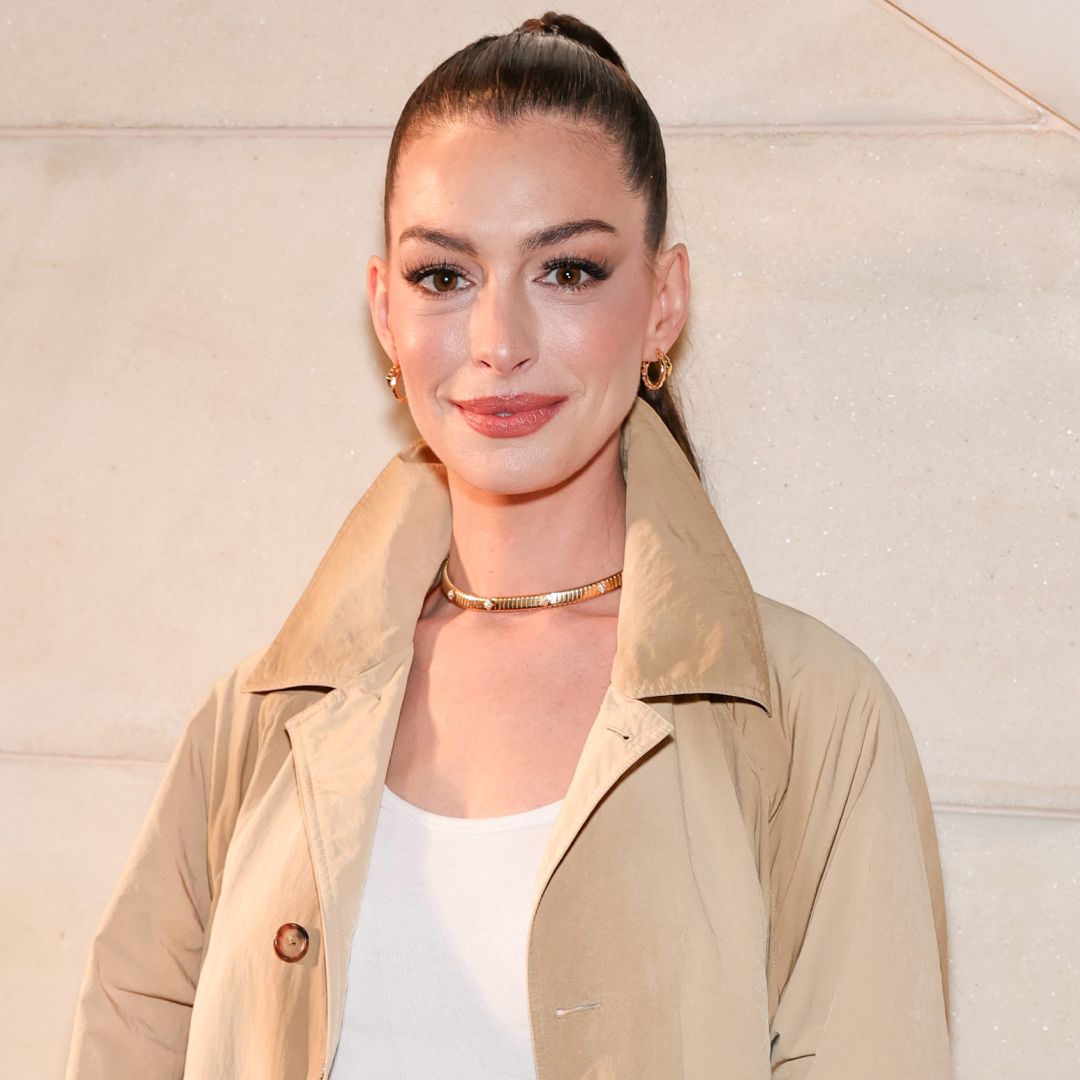 Anne Hathaway was spotted in Lake Como wearing flared jeans and Adidas Sambas