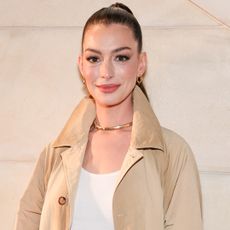 Anne Hathaway was spotted in Lake Como wearing flared jeans and Adidas Sambas