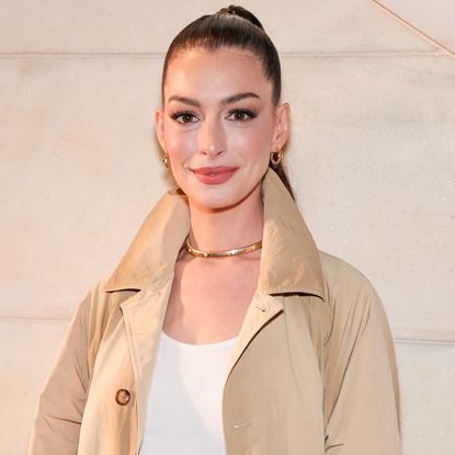 Anne Hathaway was spotted in Lake Como wearing flared jeans and Adidas Sambas