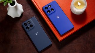 The Motorola G Stylus 5G (2025) on a dark, hardwood table.