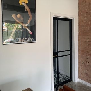 glass door with white wall
