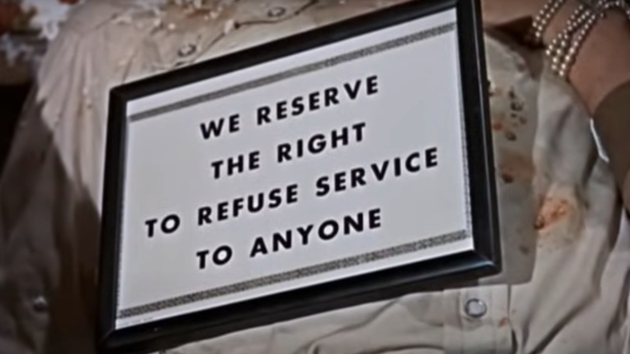 A racist sign in the movie Giant
