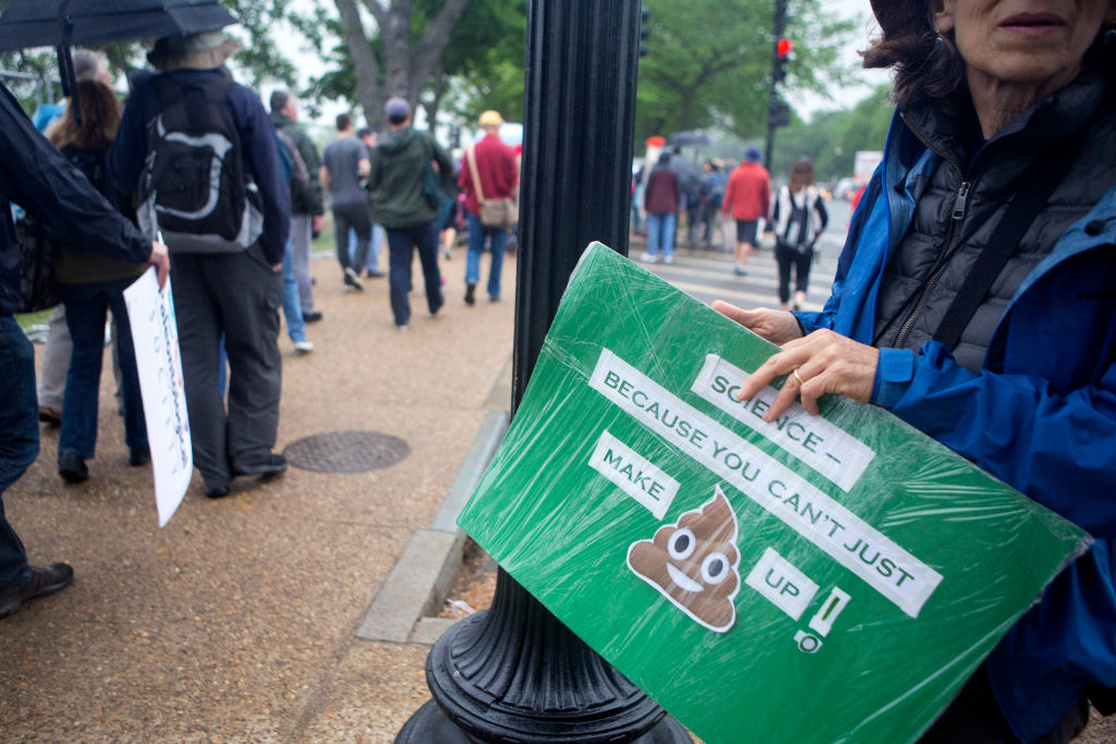 Participants gather on the National Mall for the rally before the March for Science in Washington, D.C.