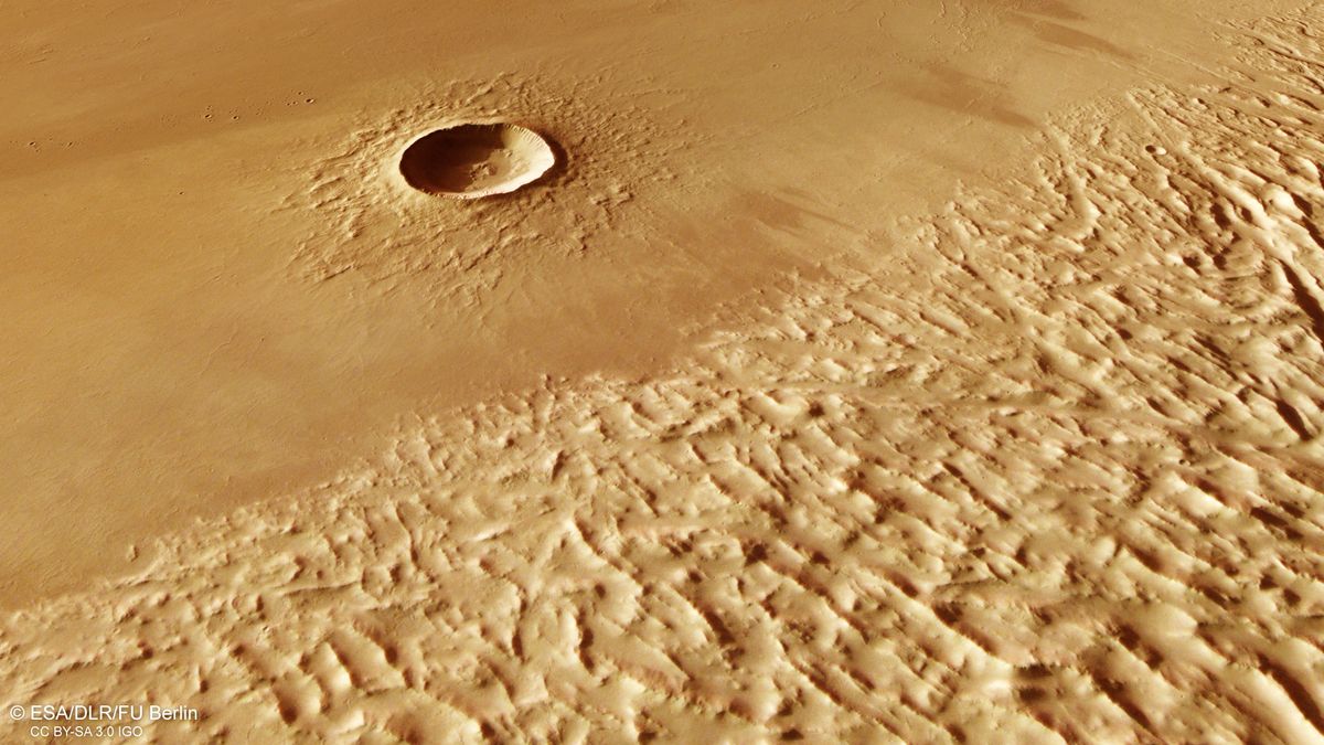 火星の地すべりは、かつて水が私たちの太陽系で最も高い火山であるオリンパスモンスを囲んでいたことを示唆しています