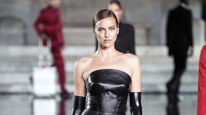 Fashion model, Fashion, Clothing, Dress, Shoulder, Fashion show, Haute couture, Glove, Strapless dress, Beauty, 