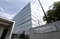 The Japan Display Inc. signage is displayed outside the company's plant in Mobara, Chiba Prefecture, Japan, on Monday, June 3, 2013.