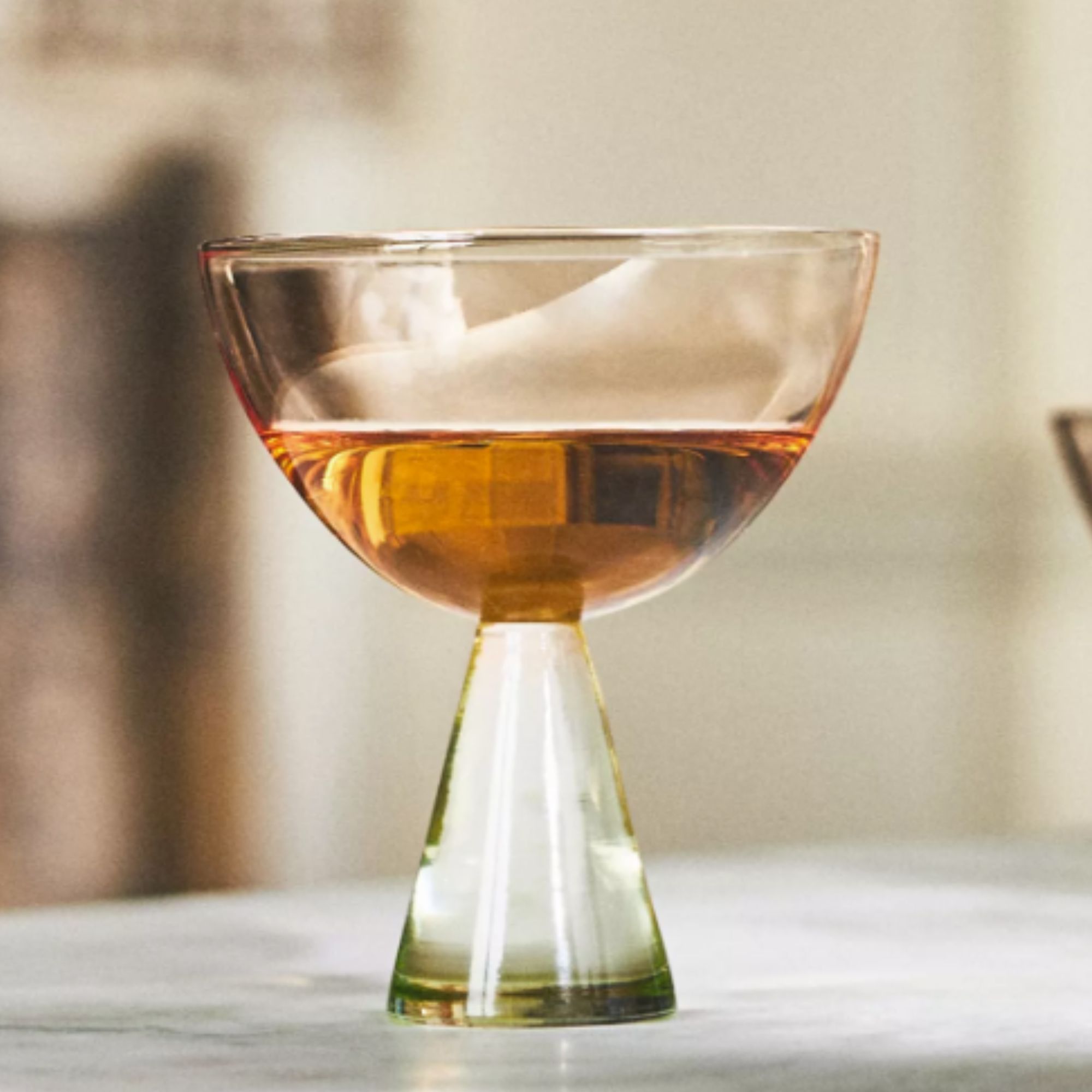 green and peach two-tone coupe glass